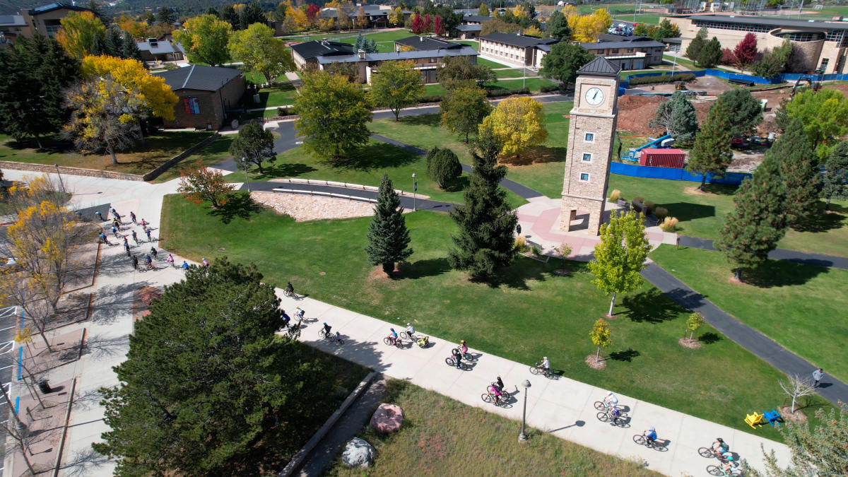 Group Bike Ride During Spoketober In Fall Via Drone